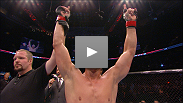With less than a minute left in a close fight at UFC 115, Mike Pyle uses a leg triangle and elbows to end things.